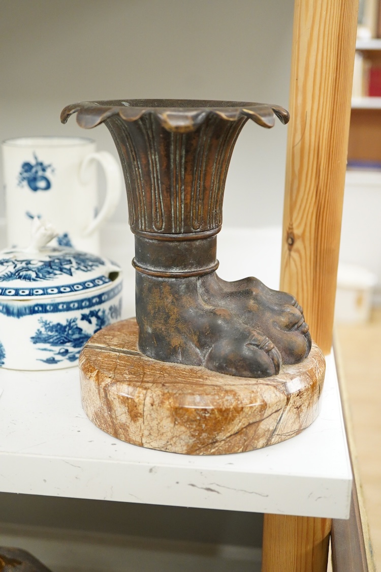 An Italian bronze vase in the form of a lion paw, raised on circular marble base, 17cm high